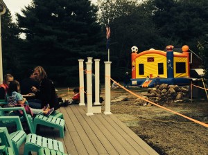 The kids loved the bounce house at the party.