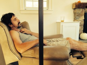 Stephen finally kicks back and relaxes in the room that he helped build.